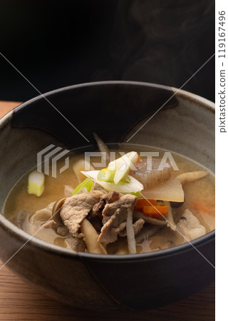 Pork soup served on a wooden table 119167496