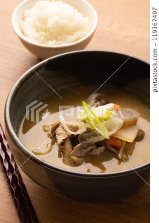 Pork soup served on a wooden table 119167497
