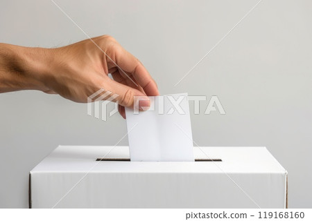 Democratic act - hand placing ballot paper in ballot box for voting, capturing essence of election concept, highlighting significance of secret ballot, and illustrating the intense preelection race Democratic act - hand placing ballot paper in ballot box for voting, capturing essence of election concept, highlighting significance of secret ballot, and illustrating the intense preelection race 119168160