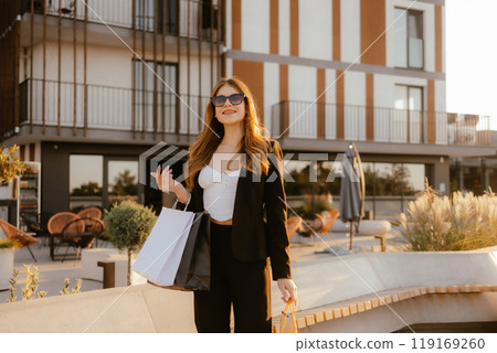 Young Woman Shopping Outdoors 119169260