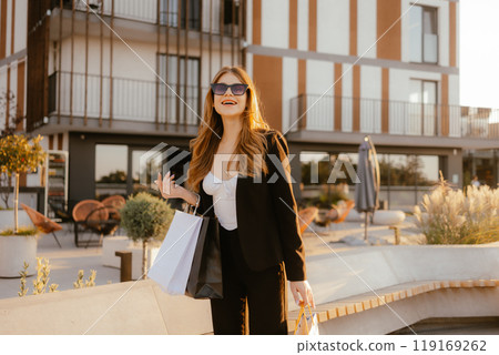 Woman Shopping in Urban Setting Woman Shopping in Urban Setting 119169262