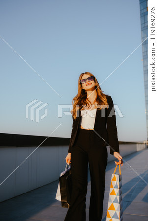 Professional Woman Shopping Outdoors 119169276