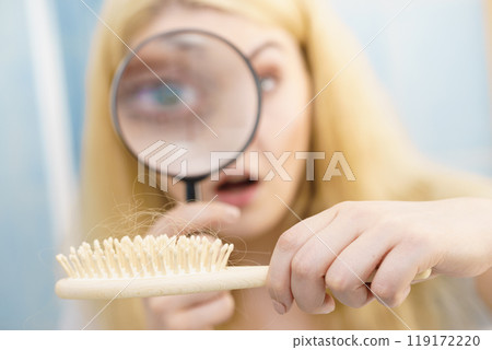 Woman magnifying hair brush Woman magnifying hair brush 119172220