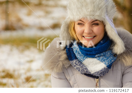 Female wearing warm outfit during winter 119172417