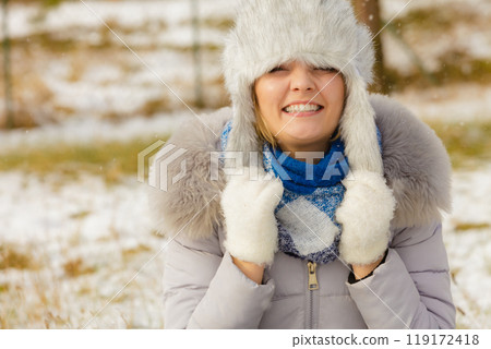 Female wearing warm outfit during winter 119172418