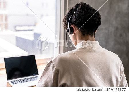 Man with intercom 119175177
