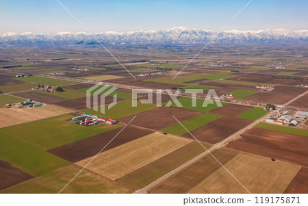 Fields spreading across the Hidaka Mountains and the Tokachi Plain, before landing at Tokachi Obihiro Airport, Hokkaido Fields spreading across the Hidaka Mountains and the Tokachi Plain, before landing at Tokachi Obihiro Airport, Hokkaido 119175871
