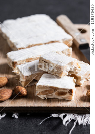 Christmas almond nougat on black slate background 119176489
