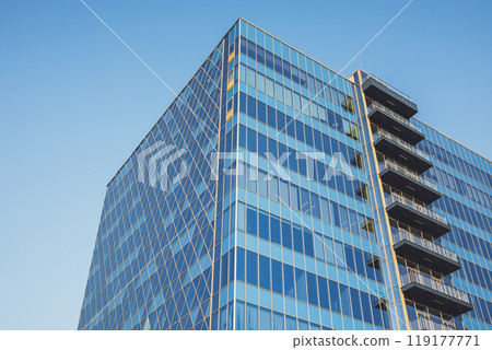 Beautiful business center in Moscow. blue apartment building. Urban modern architecture. Urban landscape. glass high-rise building 119177771