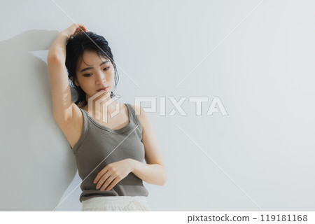 Woman in tank top Woman in tank top 119181168