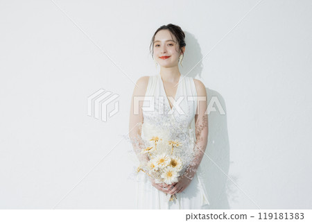 Young woman in wedding dress 119181383
