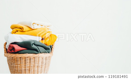 Freshly Folded Clothes in a Basket 119181491