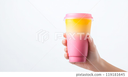 Colorful Layered Drink in a Handheld Cup Colorful Layered Drink in a Handheld Cup 119181645