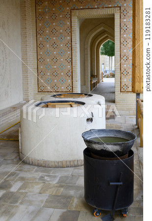 View of an open air kitchen with oven and flowers in Samarkand, Uzbekistan View of an open air kitchen with oven and flowers in Samarkand, Uzbekistan 119183281