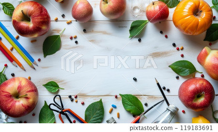 Colorful Education Back to School Background with Apples, Pencils, and Leaves on White Wooden Surface 119183691