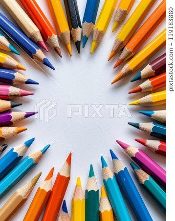 Colorful Back to School Frame Background with Pencils in Circular Arrangement on White Surface 119183880