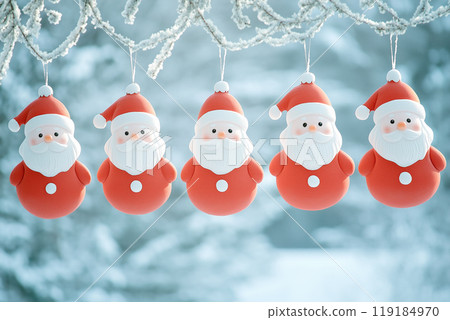 Five Santa Claus ornaments hanging from snowy branches, with snowy background. Festive Christmas decoration concept Five Santa Claus ornaments hanging from snowy branches, with snowy background. Festive Christmas decoration concept 119184970