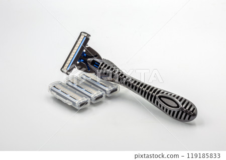 Shaving razors machine with replaceable blades closeup. Shaving razors machine with replaceable blades closeup. 119185833