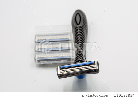 Shaving razors machine with replaceable blades closeup. Shaving razors machine with replaceable blades closeup. 119185834