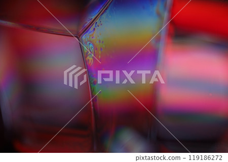 Bright reflection of liquid in macro, blue and silver colors, rainbow background, Blue bubbles in macro, connection of bubbles in macro, cell from liquid, molecules connection, ultra macro Bright reflection of liquid in macro, blue and silver colors, rainbow background, Blue bubbles in macro, connection of bubbles in macro, cell from liquid, molecules connection, ultra macro 119186272