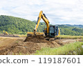 Hydraulic excavator at infrastructure development site 119187601