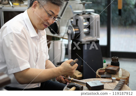 Gyeongsangnam-do, Jinju-si, Republic of Korea, October 11, 2024: Mr. Kim Myeong-su, the CEO of Jeonggeumgil Metalworking, is a person who lends gold to film companies. Gyeongsangnam-do, Jinju-si, Republic of Korea, October 11, 2024: Mr. Kim Myeong-su, the CEO of Jeonggeumgil Metalworking, is a person who lends gold to film companies. 119187912