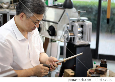 Gyeongsangnam-do, Jinju-si, Republic of Korea, October 11, 2024: Mr. Kim Myeong-su, the CEO of Jeonggeumgil Metalworking, is a person who lends gold to film companies. Gyeongsangnam-do, Jinju-si, Republic of Korea, October 11, 2024: Mr. Kim Myeong-su, the CEO of Jeonggeumgil Metalworking, is a person who lends gold to film companies. 119187920