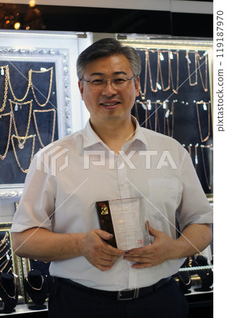 Gyeongsangnam-do, Jinju-si, Republic of Korea, October 11, 2024: Mr. Kim Myeong-su, the CEO of Jeonggeumgil Metalworking, is a person who lends gold to film companies. Gyeongsangnam-do, Jinju-si, Republic of Korea, October 11, 2024: Mr. Kim Myeong-su, the CEO of Jeonggeumgil Metalworking, is a person who lends gold to film companies. 119187970