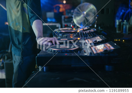 Close up view of a dj's hands Close up view of a dj's hands 119189955