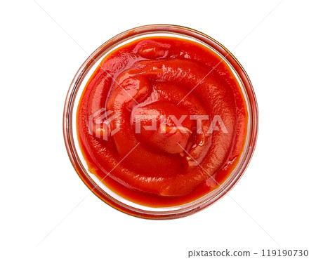 Freshly prepared tomato ketchup in a glass bowl on white isolated background. 119190730
