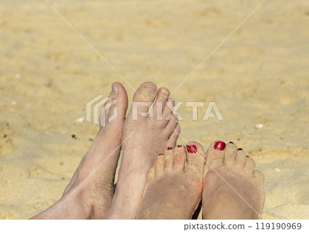 Feet on the beach Feet on the beach 119190969