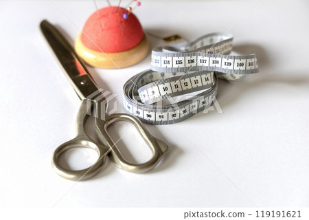 Set of sewing accessories for tailoring. Concept design and repair of clothes. Set of sewing accessories for tailoring. Concept design and repair of clothes. 119191621