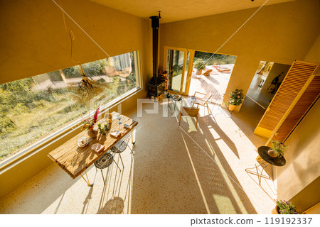 Sunlit Aerial View of Cozy Living 119192337