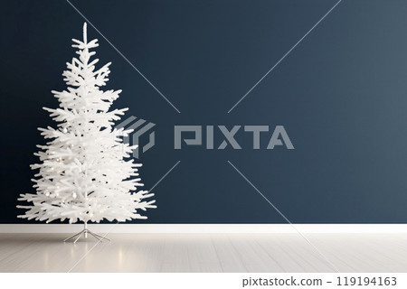White Christmas tree stands elegantly in bright room with a rich blue wall, creating cheerful holiday atmosphere 119194163