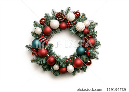 Festive Christmas wreath adorned with pine cones, berries, and ornaments isolated on white background. 119194789
