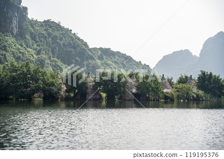 Landscape view of Trang An in Ninh Binh, Vietnam. Landscape view of Trang An in Ninh Binh, Vietnam. 119195376