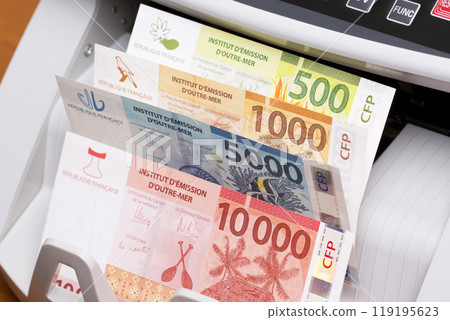 CFP franc in the counting machine CFP franc in the counting machine 119195623