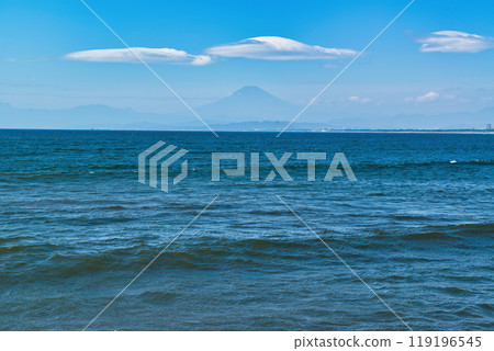 View of Mt. Fuji from Enoshima: Surfer and clouds 119196545
