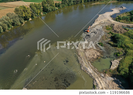 Sand and gravel exploitation in the river aerial view Sand and gravel exploitation in the river aerial view 119196686