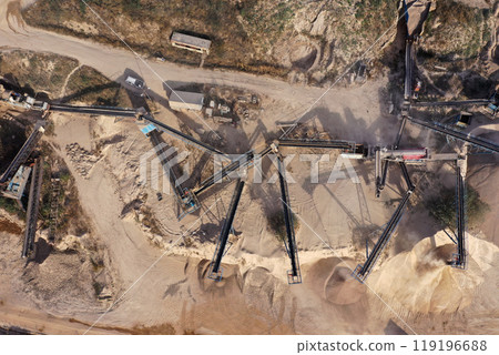 Aerial view of a stone quarry with working stone crushing machines 119196688