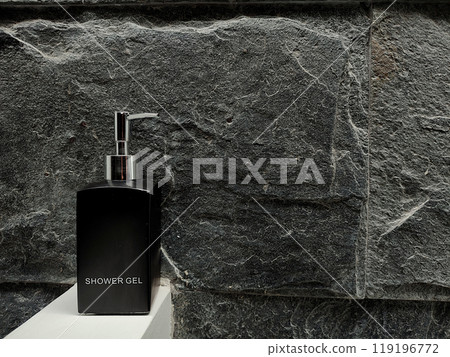 Black bottles of shower gel in the bathroom 119196772