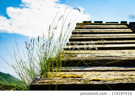 Old wooden stairway to sky. Old wooden stairway to sky. 119197418