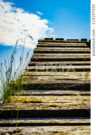 Old wooden stairway to sky. Old wooden stairway to sky. 119197420