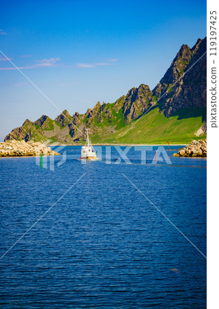 Seascape with fishing boat and stone breakwater Seascape with fishing boat and stone breakwater 119197425