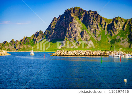 Seascape with fishing boat and stone breakwater Seascape with fishing boat and stone breakwater 119197426