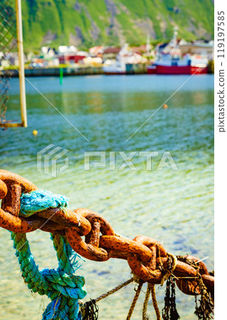 Rusty old metal chain links in port. Rusty old metal chain links in port. 119197585