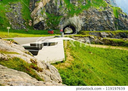 Road with old tunnel in mountains Norway 119197639