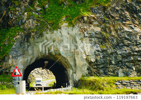Road with old tunnel in mountains Norway Road with old tunnel in mountains Norway 119197663