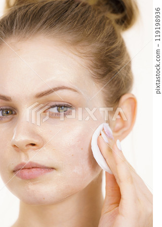 Girl removes mask cosmetic 119198936