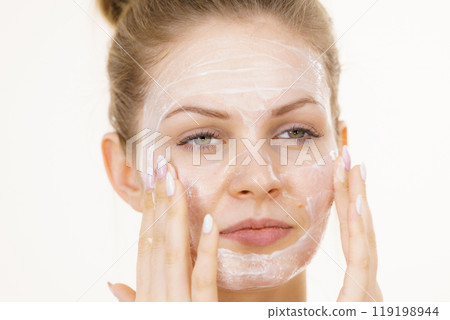 Girl apply cream cosmetic Girl apply cream cosmetic 119198944